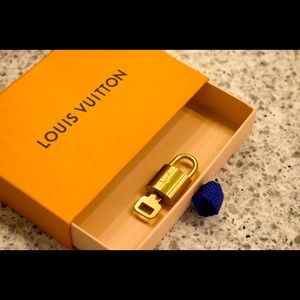 Gold Louis Vuitton Lock and Key